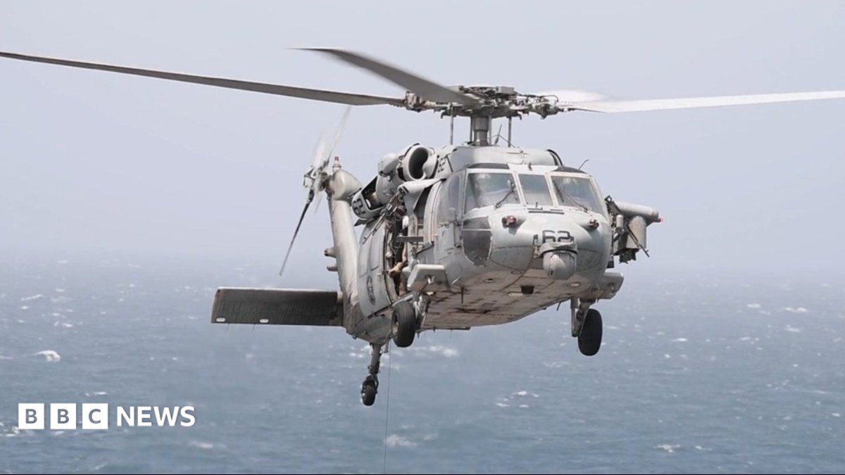 A US helicopter fires two Hellfire missiles into a cargo ship's engine room, and Iran says the strait stays shut
