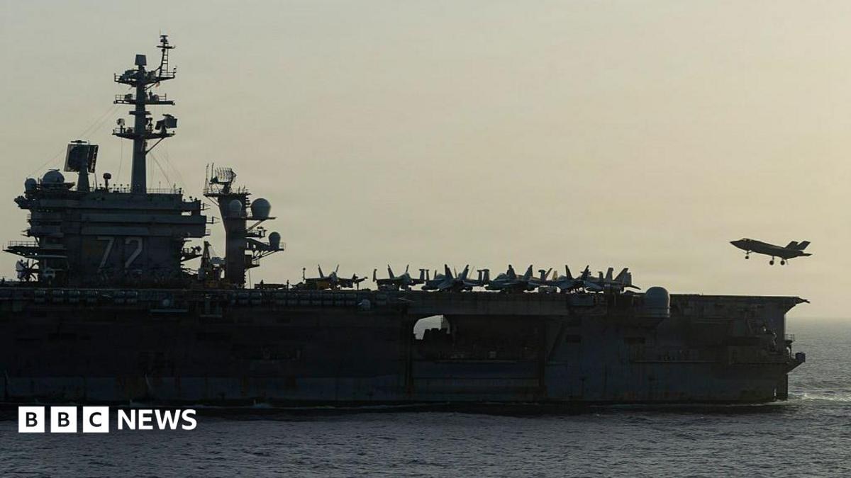 A second carrier sails for the Middle East to relieve a ship that has been at sea 250 days, after a sailor went overboard
