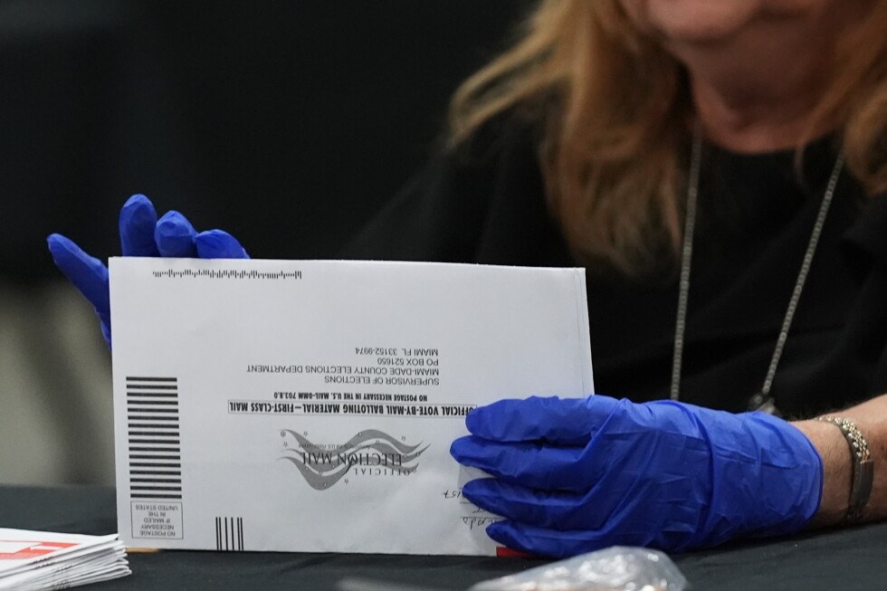 A federal judge blocks the Postal Service's mail ballot rule for 14 days, three days after the Supreme Court cleared the way for it